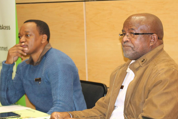 Messrs. TP Duma, the Director for Organisational Development (right) and M. Mdunge, the Deputy Director for Labour Relations (left)