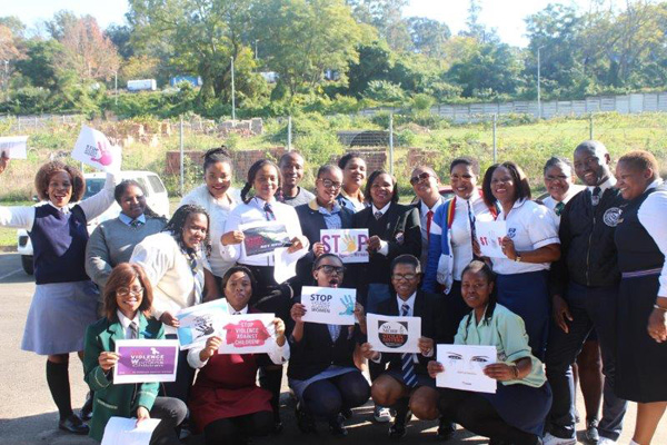 Southern Region staff members wearing their school uniforms