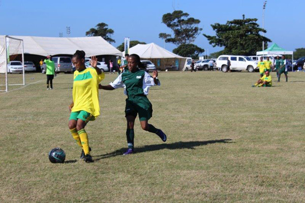 (Above in Yellow) Zethembiso Mthuli playing for the women’s soccer game