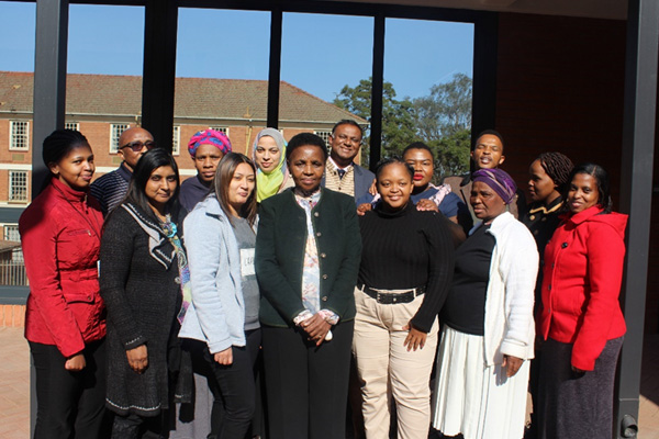 Above: Mrs Pumza Tuswa, the training facilitator (front row in the centre) with the officials who attended the course
