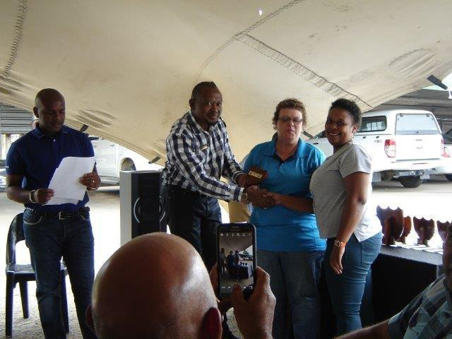 Auxiliary Services Practitioners Mrs ER Bugden & Ms SM Masango receiving a gift