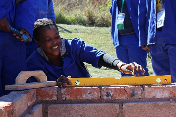 Hlengiwe Mthembu (30yrs) showing off her plumbing skills.